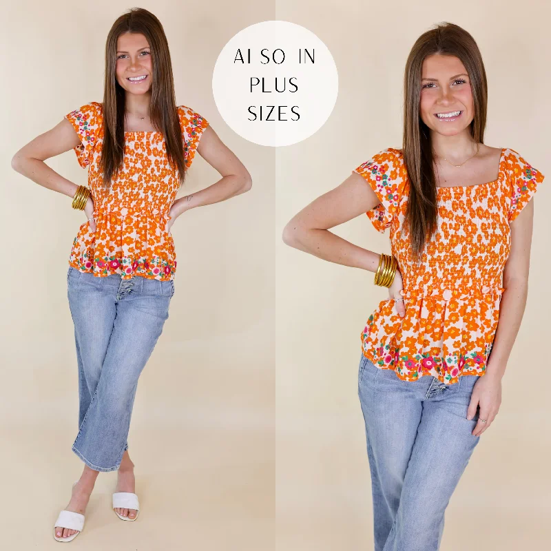 Blossom Boulevard Smocked Floral Peplum Top with Floral Embroidery in Orange Graceful Drape